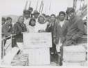 Image of Nain Eskimos [Inuit] (with United Rexall Drug Co. Crates) on board